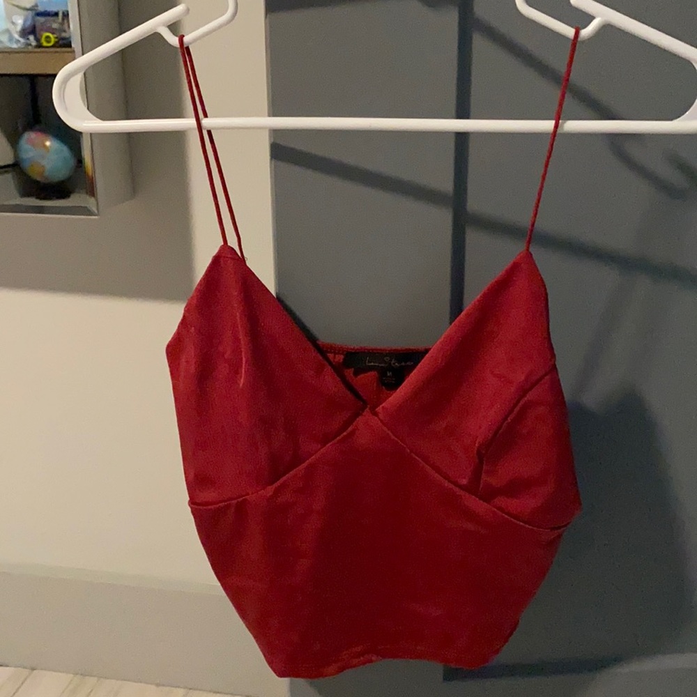 Super cute CROPPED red top. Size medium. Never worn.